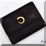 H81. Vintage Cartier panther logo cowhide trifold wallet. Wear on one corner. - $125 